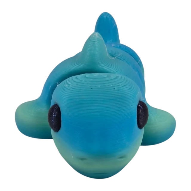 Blue and green articulated shark
